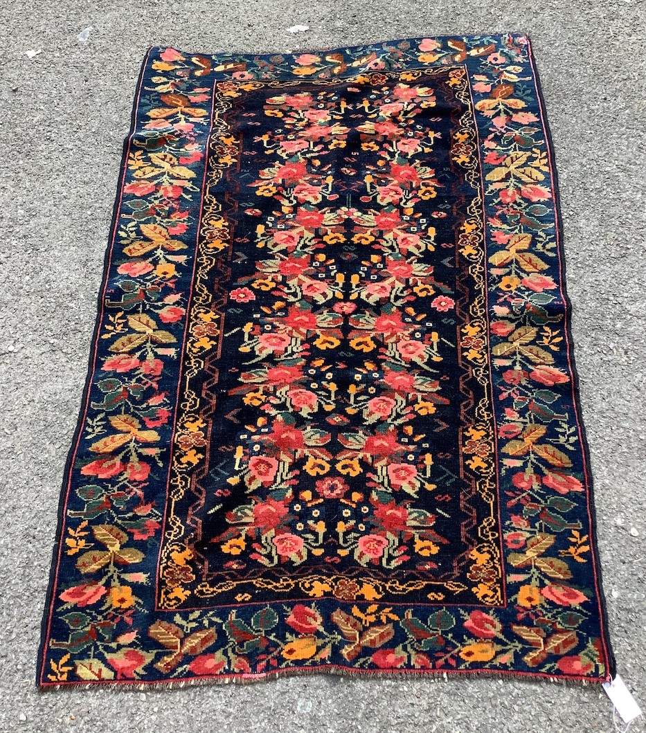 A Kirman style blue ground floral rug, 160 x 105cm